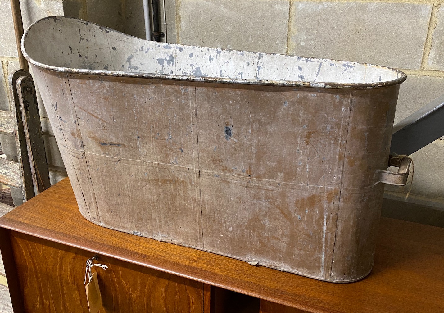 A vintage painted tin bath, height 55cm